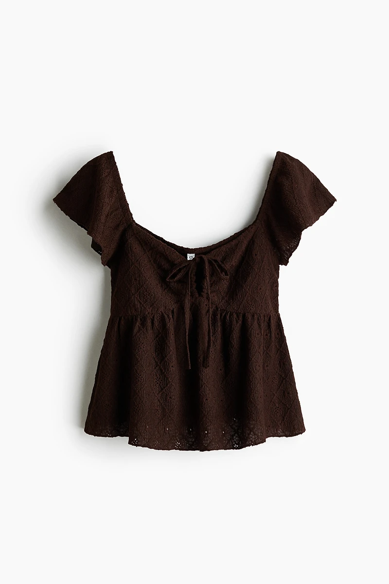 Blouse en jersey pointelle