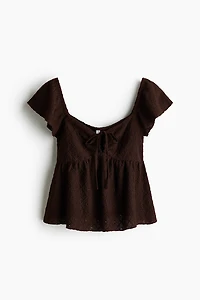 Blouse en jersey pointelle