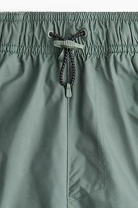 Short de sport long style cargo