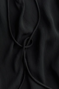 Blouse en mousseline froissée