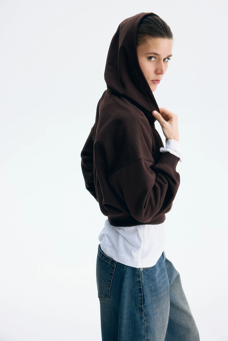 Veste courte à fermeture éclair avec capuche