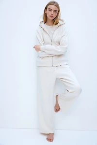 Veste à capuchon glissière