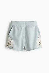 Short en lin mélangé avec broderie anglaise