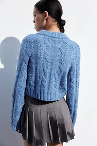 Chandail en tricot torsadé avec encolure V