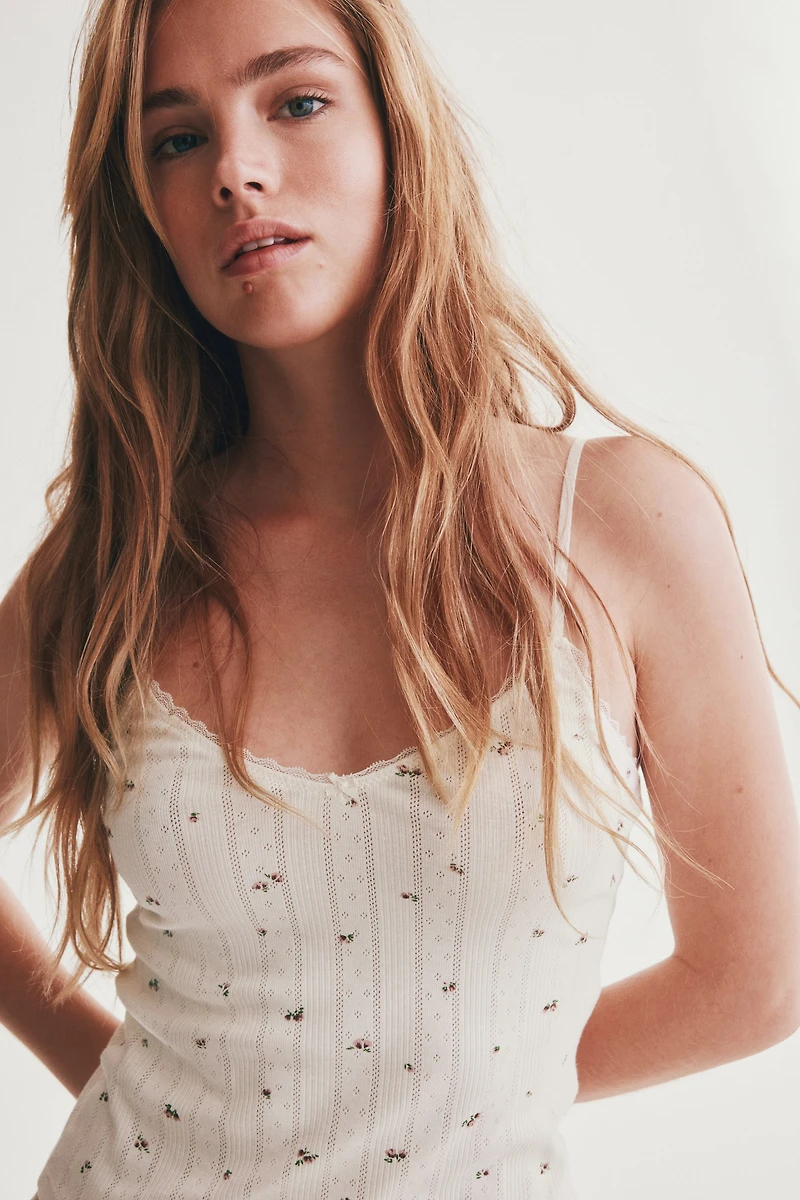 Haut à bretelles fines en pointelle