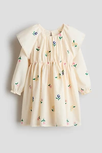 Robe brodée et volantée en coton