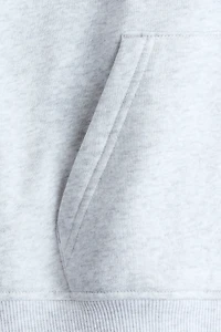 Veste à capuche fermeture éclair avec broderie