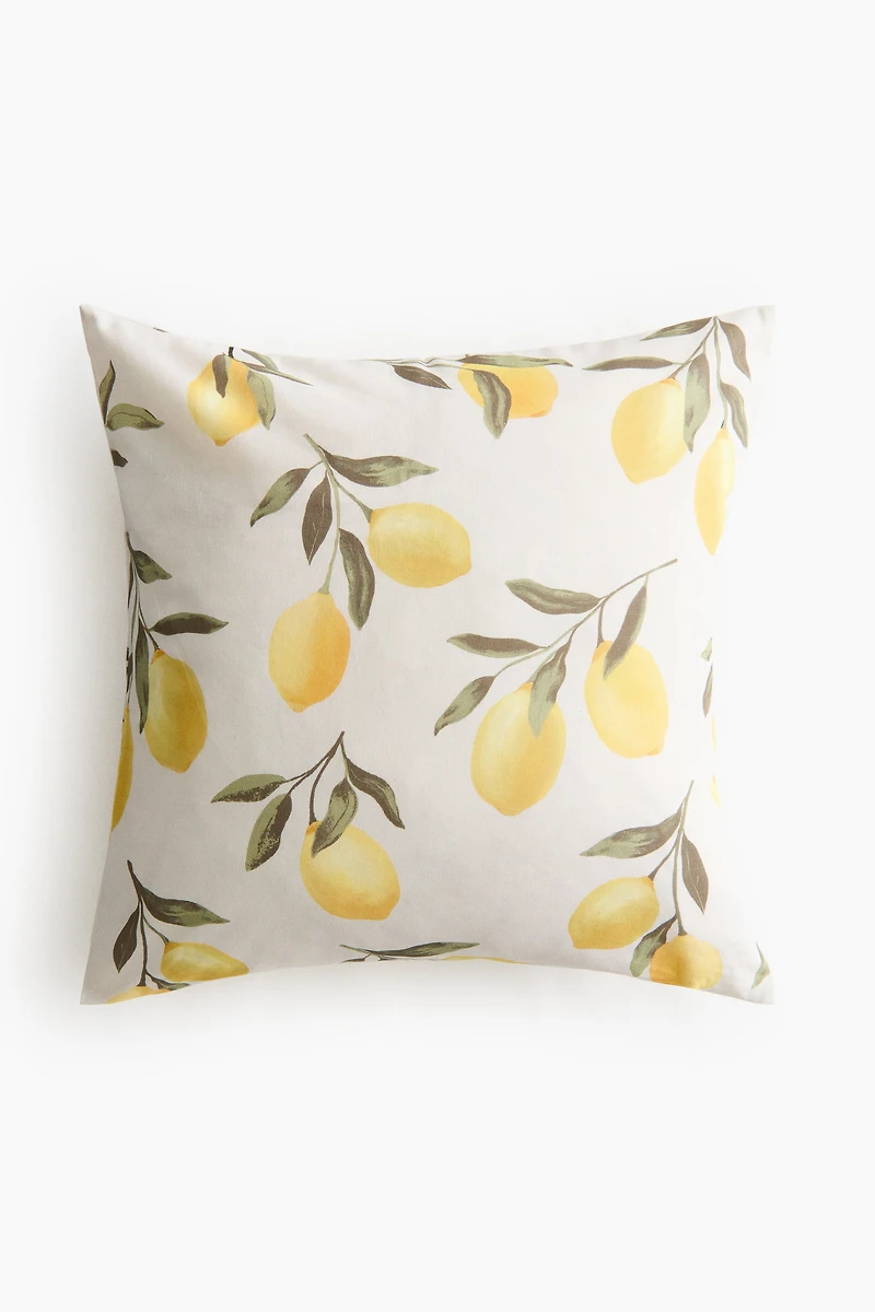 Housse de coussin à motif