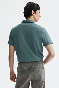 Polo près du corps