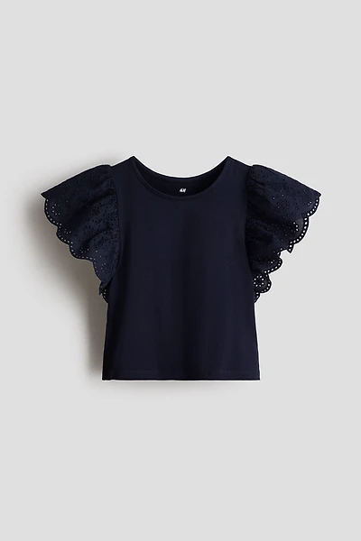 Haut à manches volantées avec broderie anglaise