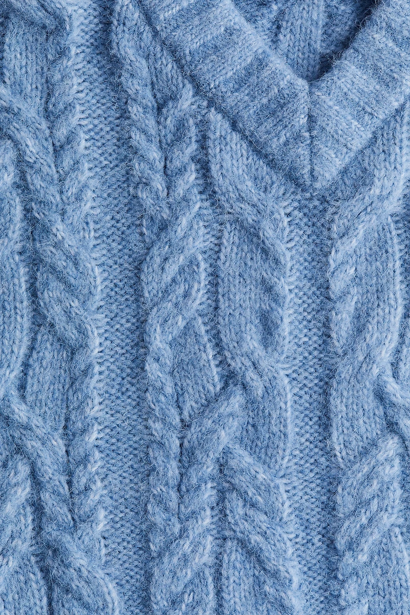 Chandail en tricot torsadé avec encolure V