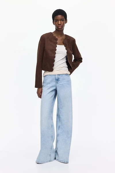 Veste à bords festonnés