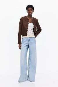 Veste à bords festonnés