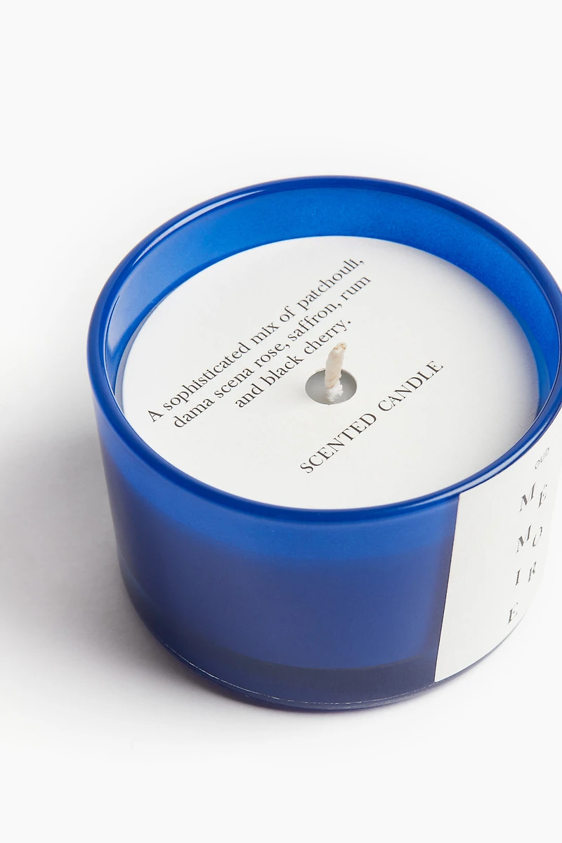 Bougie parfumée dans un pot en verre