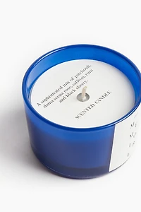 Bougie parfumée dans un pot en verre