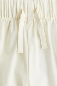 Cropped Pants with Eyelet Embroidery