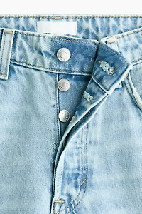 Jean à la cheville taille classique jambes tonneau