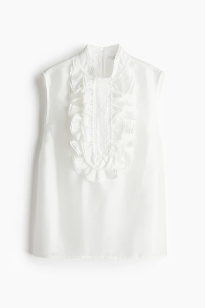 Blouse à jabot volanté