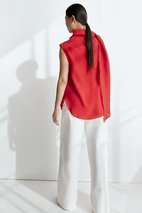 Blouse sans manches avec col écharpe