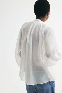 Blouse à volant en lyocell mélangé
