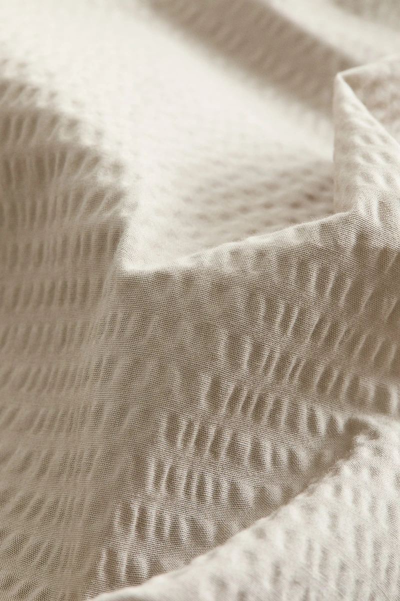 Taie d'oreiller en crépon de coton