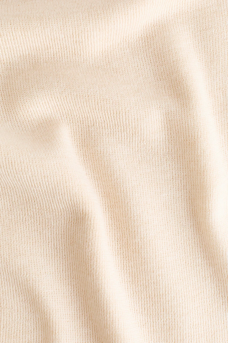 Haut en fin tricot à col cheminée