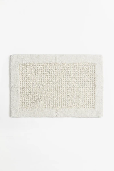Tapis de bain en coton touffeté