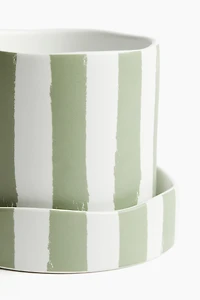 Pot de fleurs à motif avec soucoupe