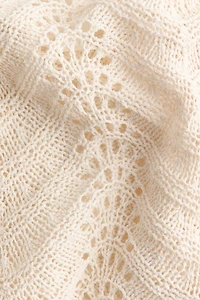 Haut à dos nu en tricot pointelle