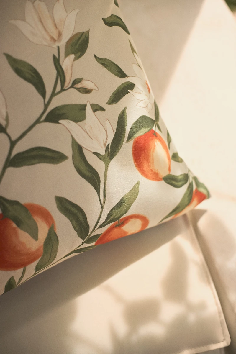 Housse de coussin à motif
