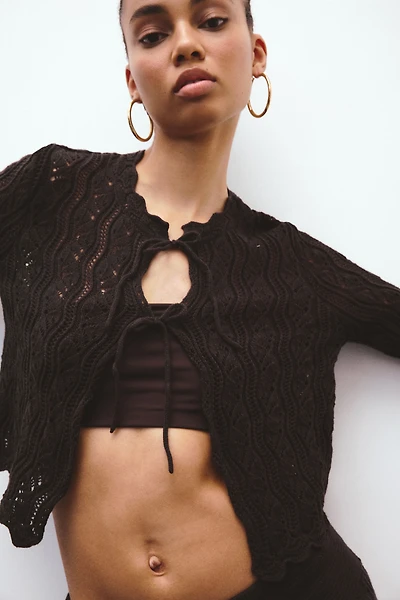 Gilet en tricot pointelle avec liens à nouer