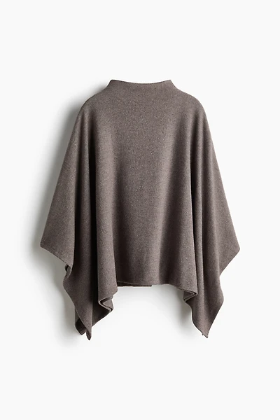 Knitted turtleneck cape