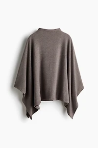 Knitted turtleneck cape