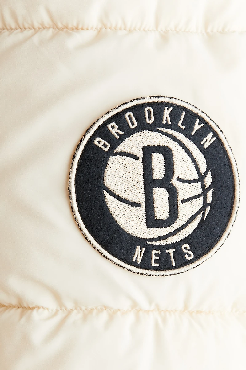 Manteau court matelassé