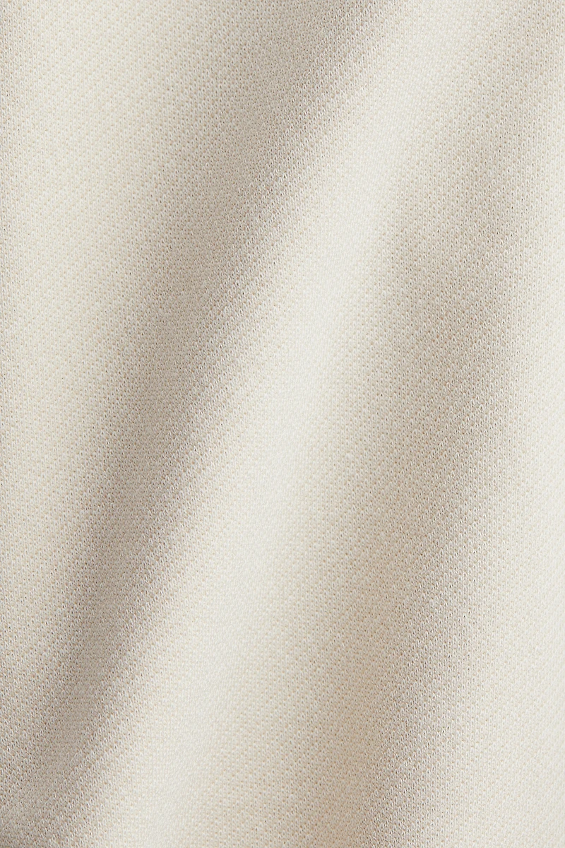 Haut péplum en jersey point de Rome