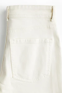 Jean ample à la cheville taille haute