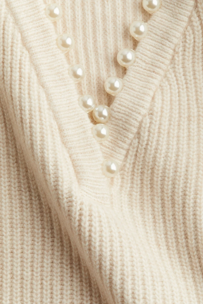 Chandail avec perles fantaisie