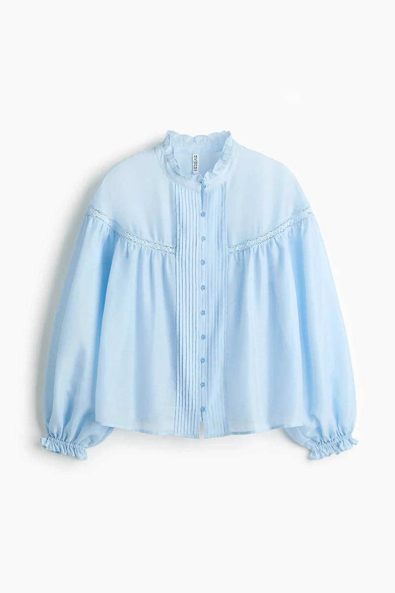 Blouse à volants avec manches ballon