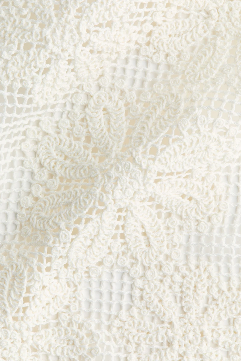 Haut de plage à l’aspect crochet avec dos ouvert