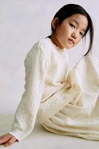Chandail en tricot pointelle de coton