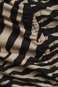 Robe à effet drapé