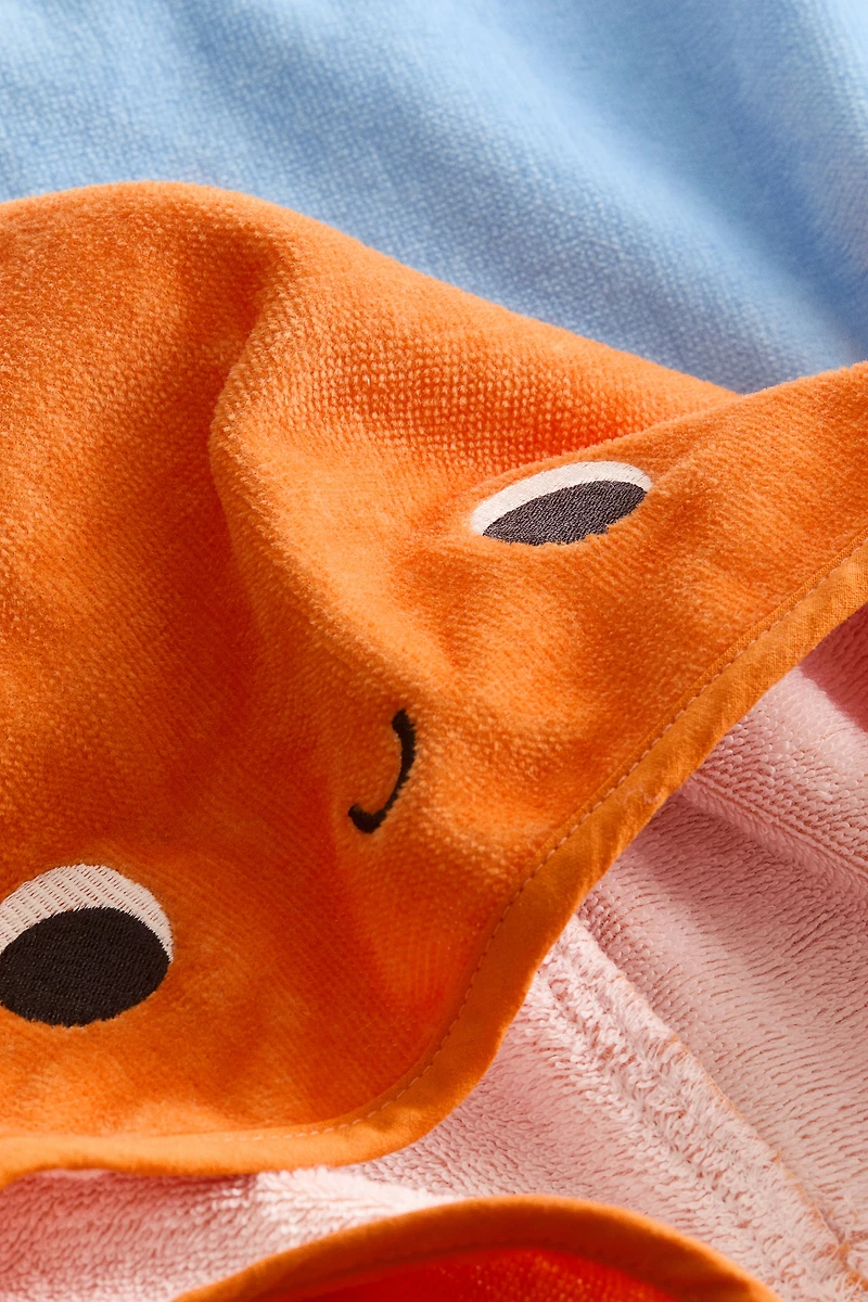 Cape de bain pour bébé