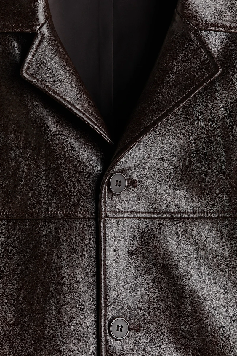 Veste en tissu enduit