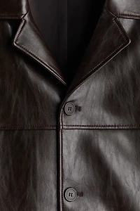 Veste en tissu enduit