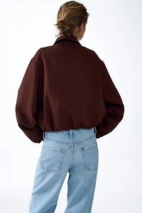 Veste ample à effet bouffant au bas