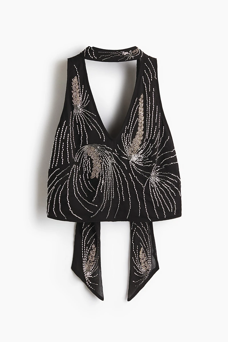 Haut dos découvert orné