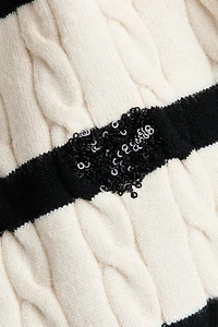 Haut en tricot torsadé