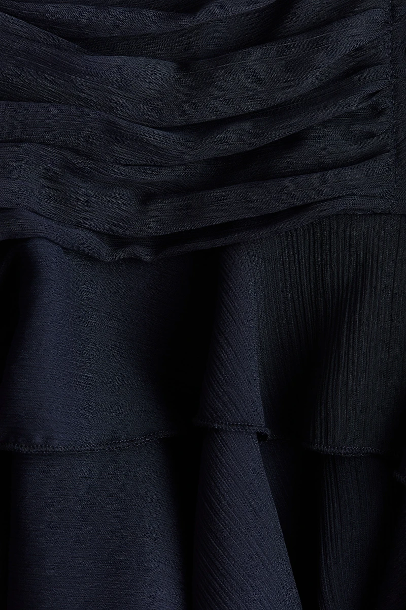 Robe à bretelles fines en mousseline effet drapé