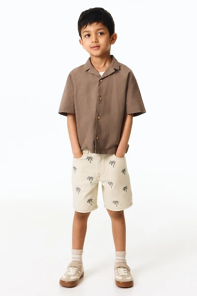 Short brodé en sergé