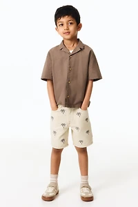 Short brodé en sergé
